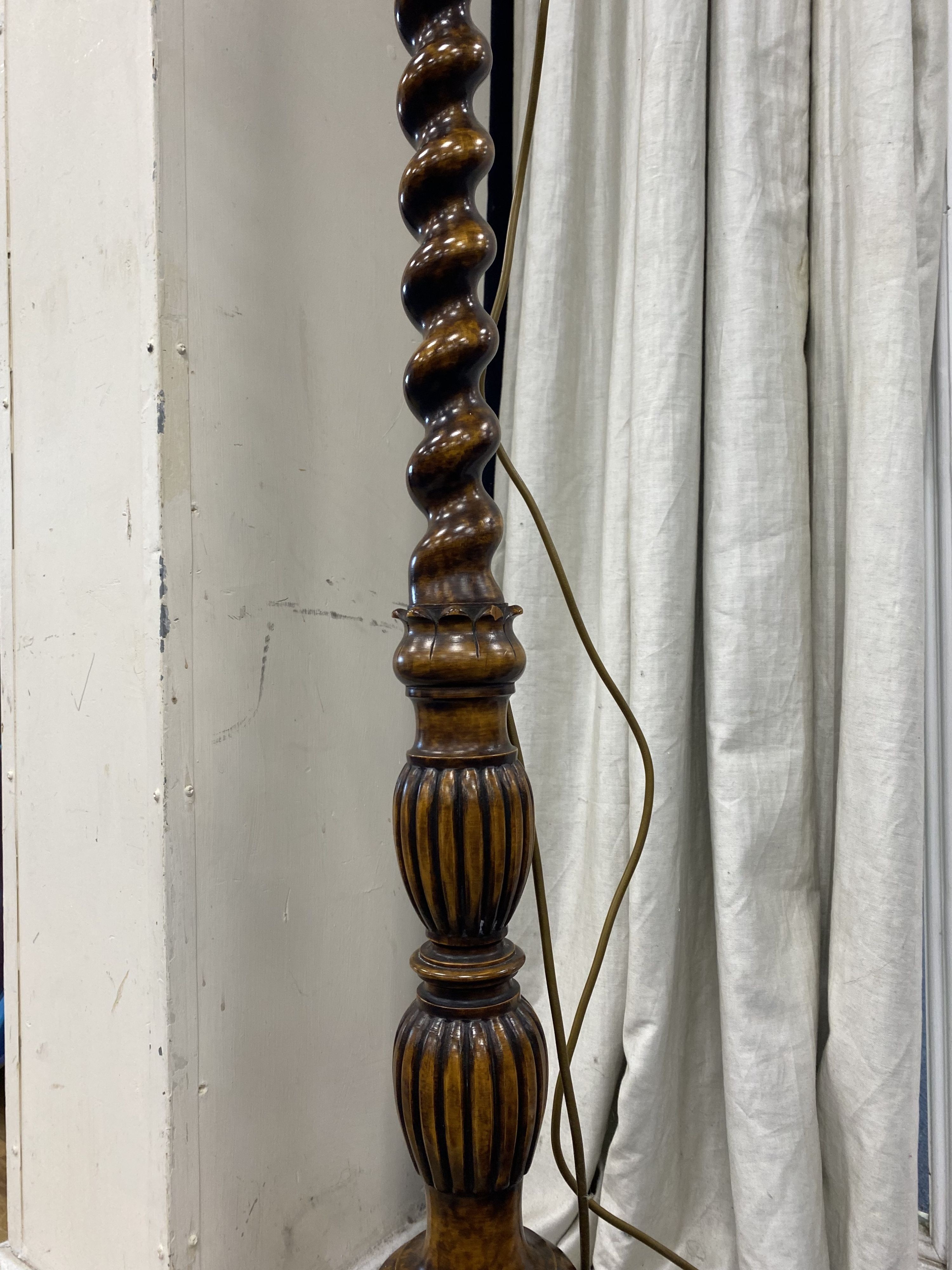 An early 20th century spiral turned walnut standard lamp, height 150cm